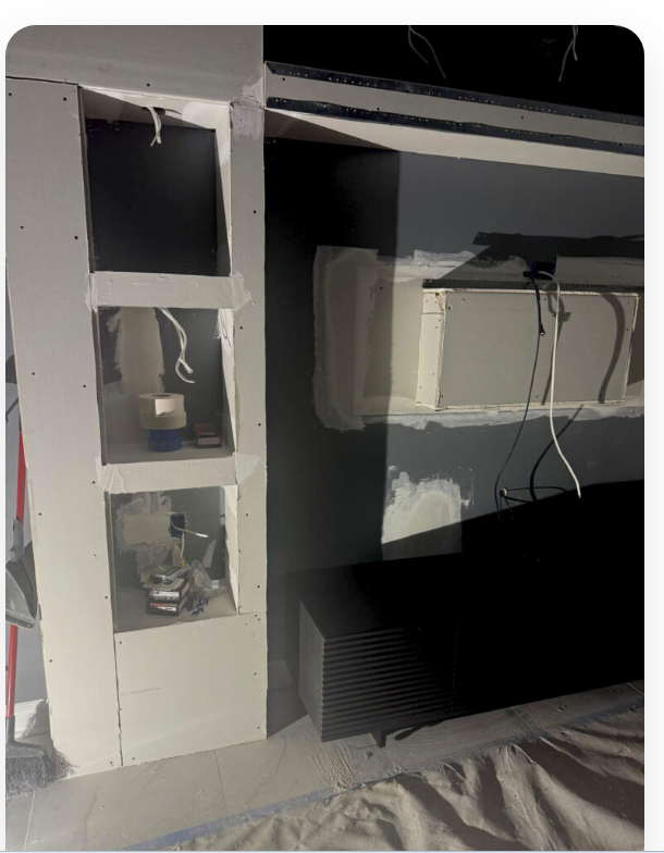 Custom wall and equipment spaces being prepared during a Soft Media Systems installation.